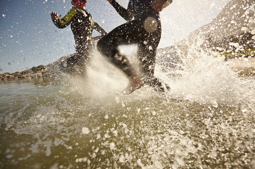 triathlon-participants-running-into-the-water-for-2021-08-26-19-57-59-utc Large