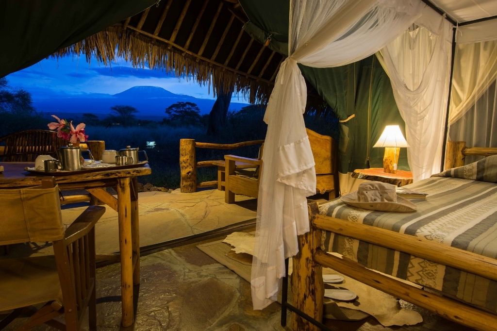 Explore Kibo Safari Camp with Nomad Africa. Discover safari adventures, luxury accommodations, and wildlife experiences.